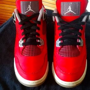 AIR JORDAN 4s in red size 6y
